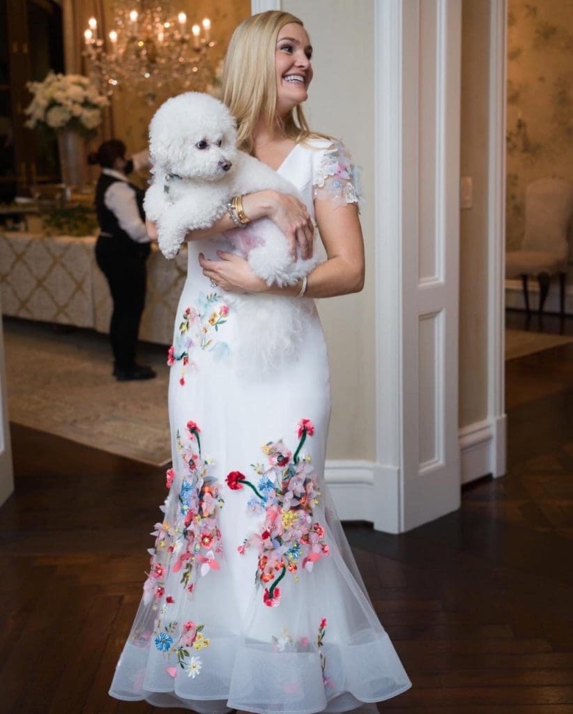 Frances Moody, pictured her with Nobel, designed her engagement party dress with Dallas-based designer Nardos Imam.