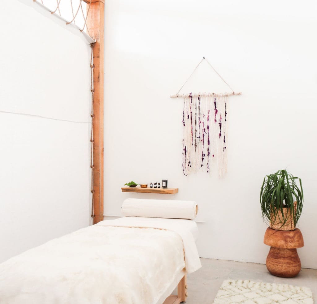 A simple, soothing aesthetic surrounds each heated massage table at The NOW, opening locations in Dallas, Houston, and Austin this year. 