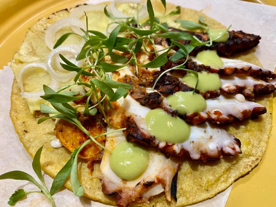 A grilled octopus taco from Revolver Taco Lounge.