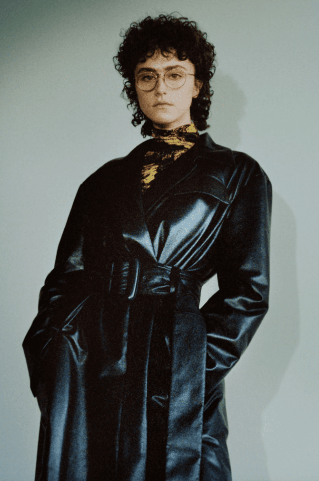 Ella Emhoff models Proenza Schouler black lambskin trench coat. (Photo courtesy of Proenza Schouler)