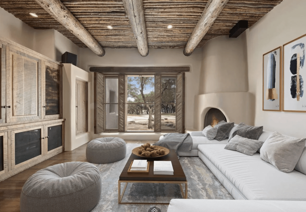 Viga ceilings with saguaro cactus ribs throughout much of the George Strait home in San Antonio emphasize the Santa Fe design motif. (Photo by LRES)