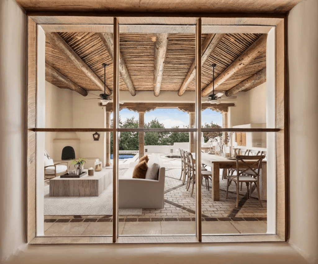 Outdoor living plays as important a role as indoors at the Bill Tull designed San Antonio home of George Strait. (Photo by LRES)