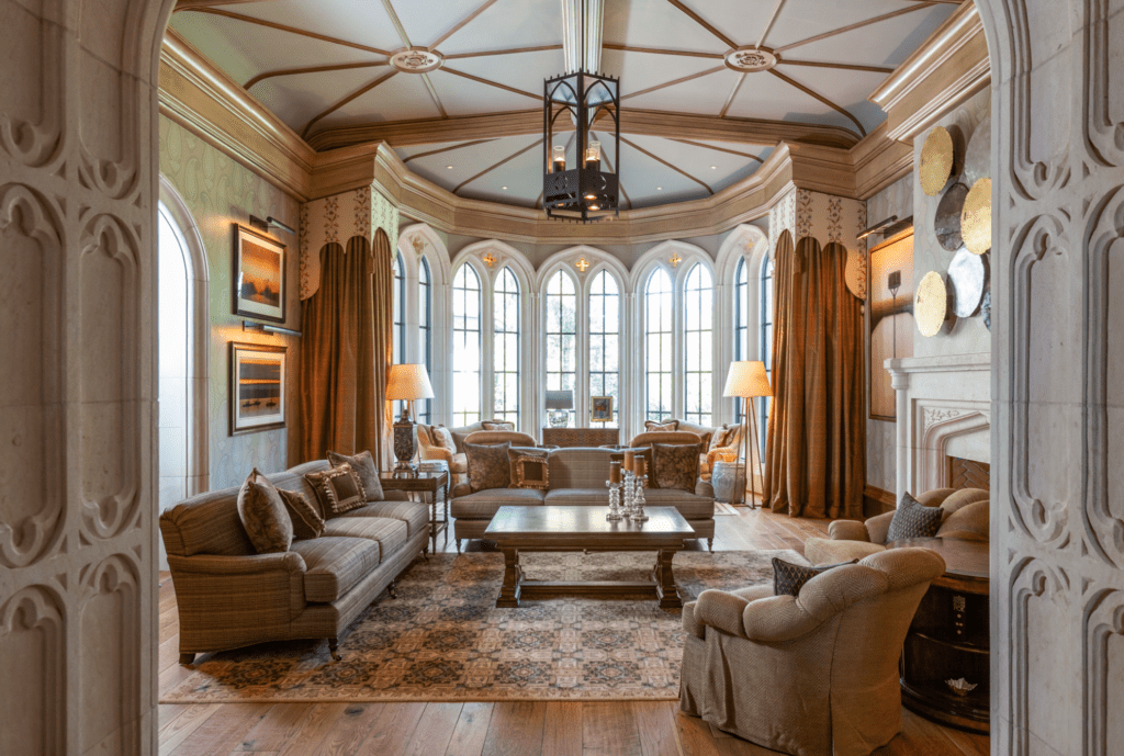 The living room in the mansion at 3996 Inverness in River Oaks features a 16-fot decorative ceilings. (Photo by Julie Soefer)
