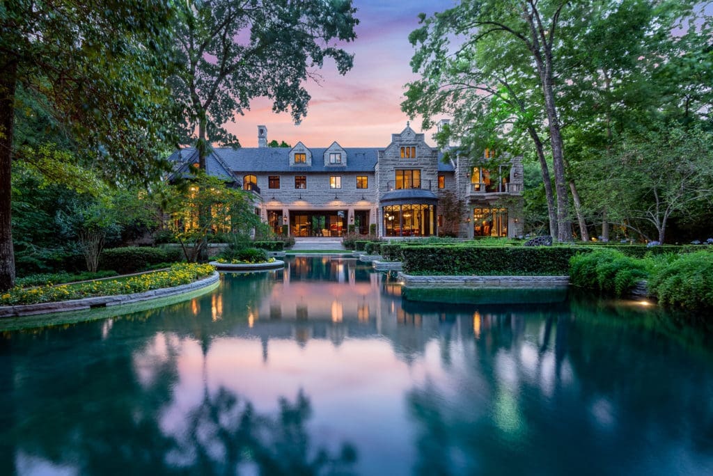The massive reflecting pool provides sanctuary at this new listing by Icon Global Group. 