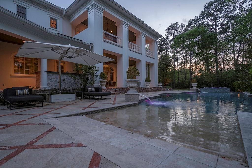 The vast 9,585 sq.ft. house at 6 Fluery Way is typical of homes in the Carlton Woods section of The Woodlands.