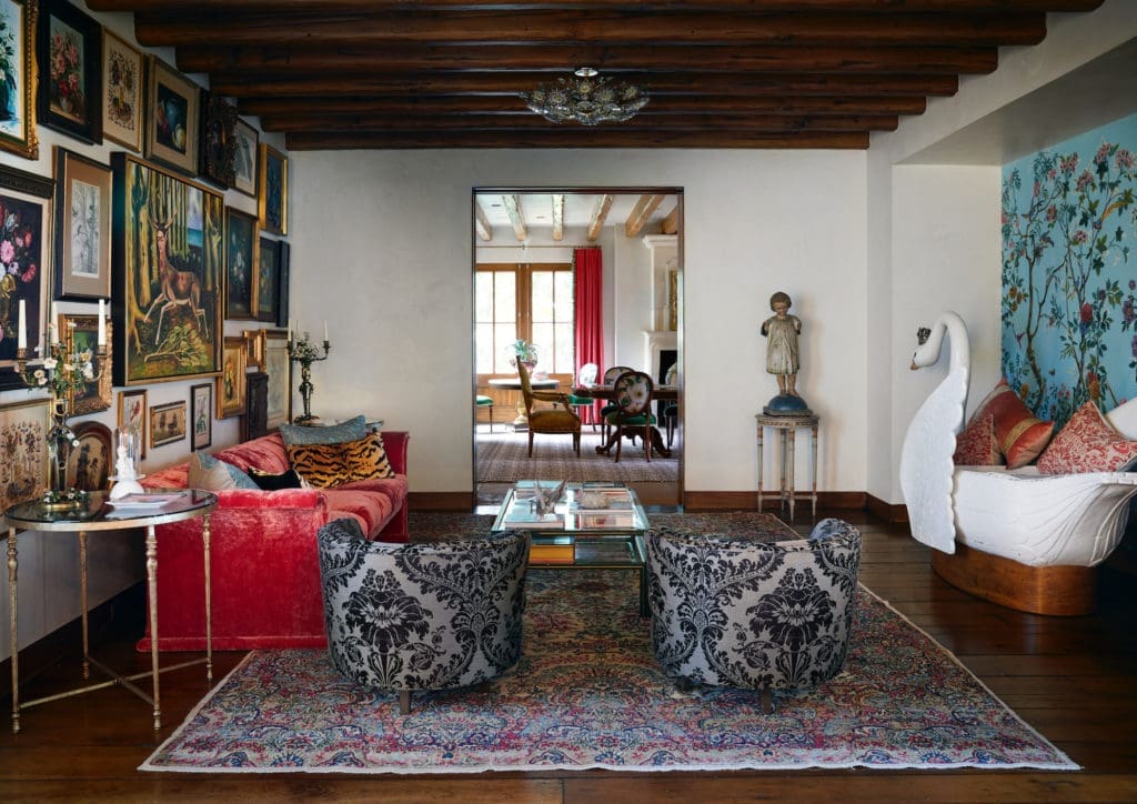 Vintage barrel-back chairs in damask fabric from Culp Associates. Antique Persian rug. (Photo by Pär Bengtsson)