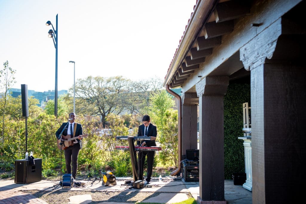 American Idol alum Adrian Michael performs for the wedding staging at Hermann Park Conservancy's Lott Hall.  (Photo by Sarah Austin of Chris Bailey Photography)