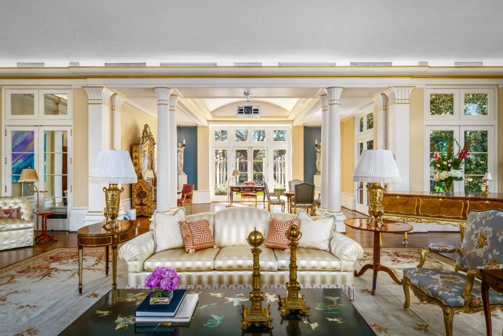 The living room of the Gerald Hines house in River Oaks features Venetian plastered walls and columns with Egyptian-inspired pilasters and an abundance of gilt trim. (Photo by Sonya Bertolino)