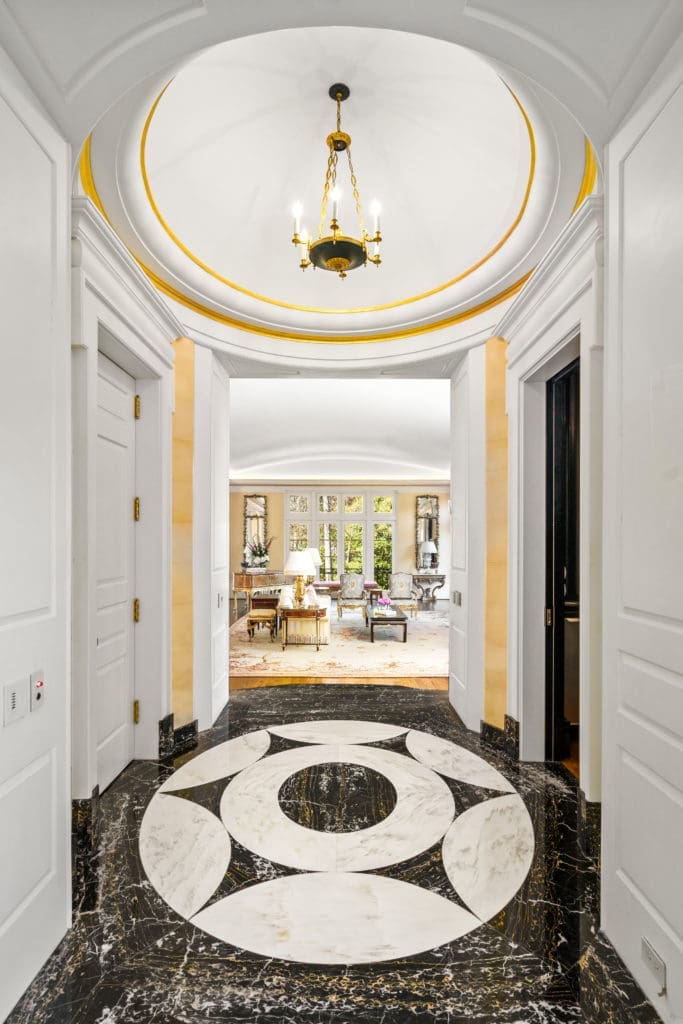 Ornate hallways in the Gerald Hines River Oaks home to lead beautifully-decorated rooms. (Photo by Sonya Bertolino)