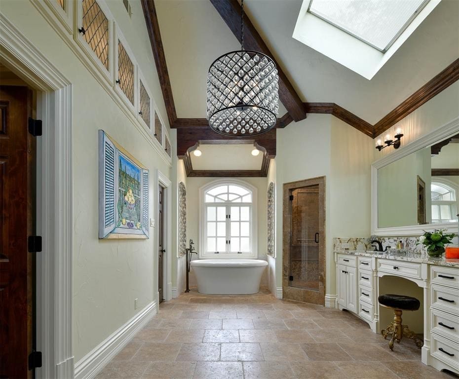 The master bath with soaker tub and steam shower.
