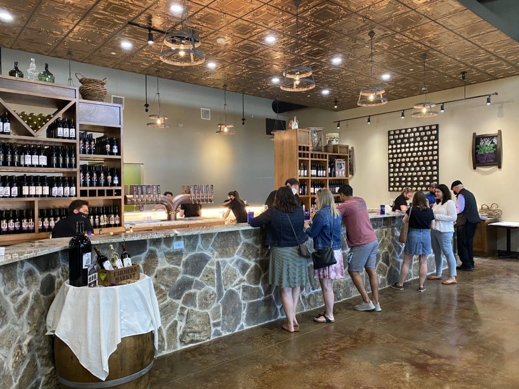 The Messina Hof Harvest Green Winery & Kitchen outside of Richmond, Texas, boasts an 83-foot long tasting bar.