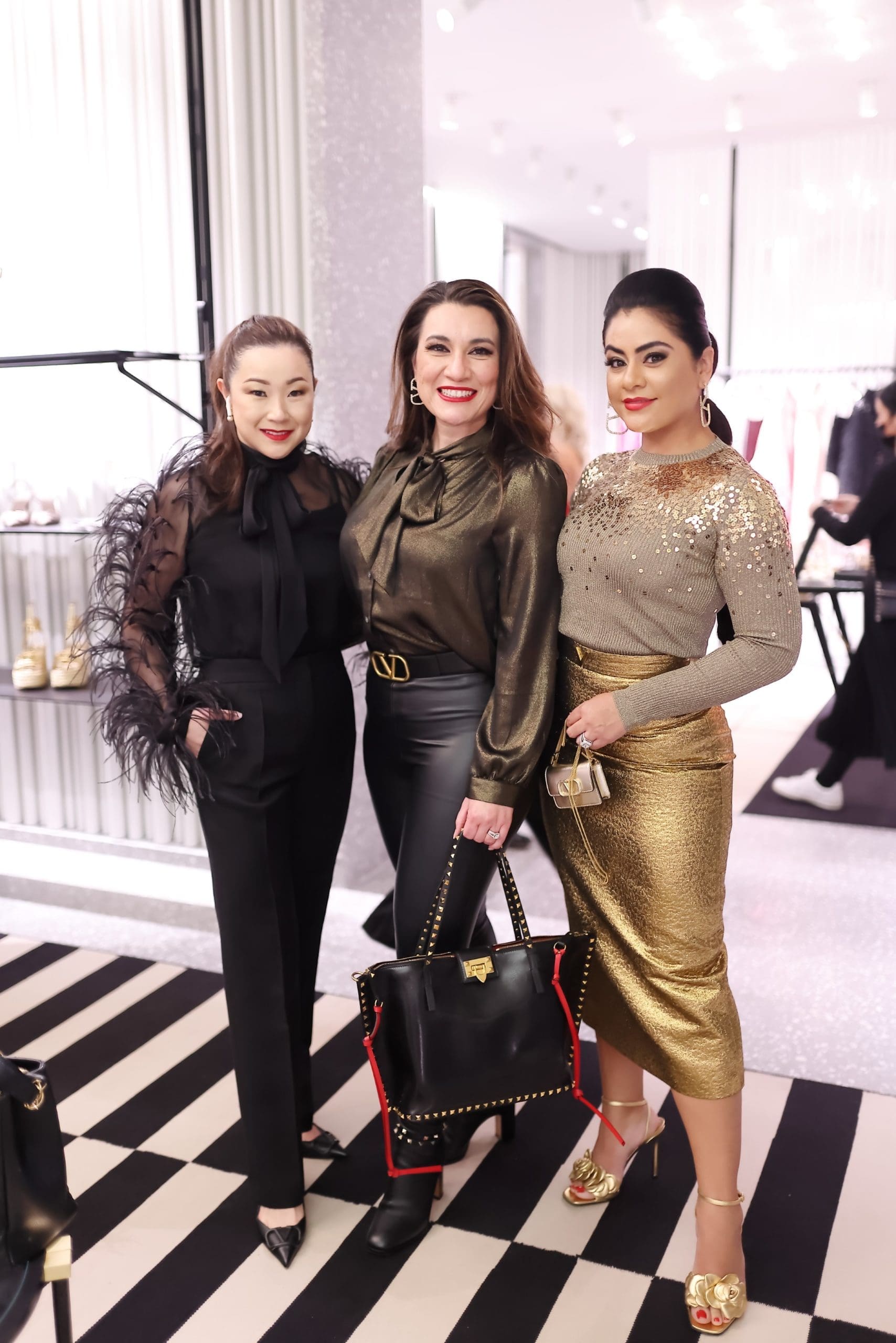 Sharon Torres, Isela Garcia, Elia Gabbanelli at the Valentino boutique opening in The Galleria benefiting  Fabrica de Milagros in the Dominican Republic. (Photo by Quy Tran)