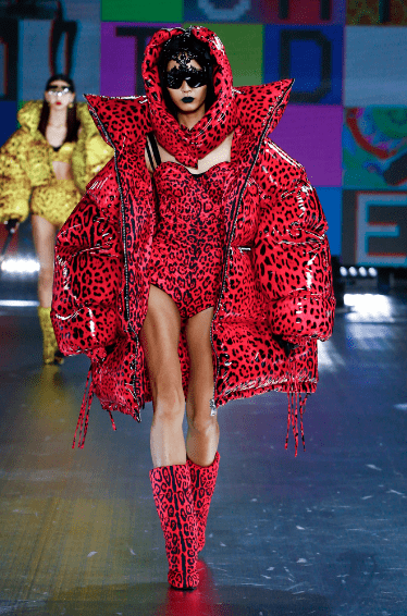 Dolce and Gabbana red and black leopard print puffer jacket, hood, bodysuit, and boots. (Photo courtesy of Dolce and Gabbana)