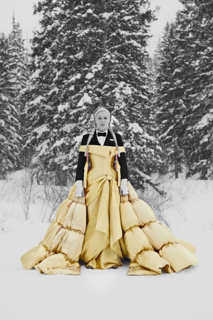 Lindsay Vonn was the star of a video featuring the fall 2021 Thom Browne collection. She wore a gold quilted down dress draped over a man's suit. (Photo courtesy of Thom Browne)