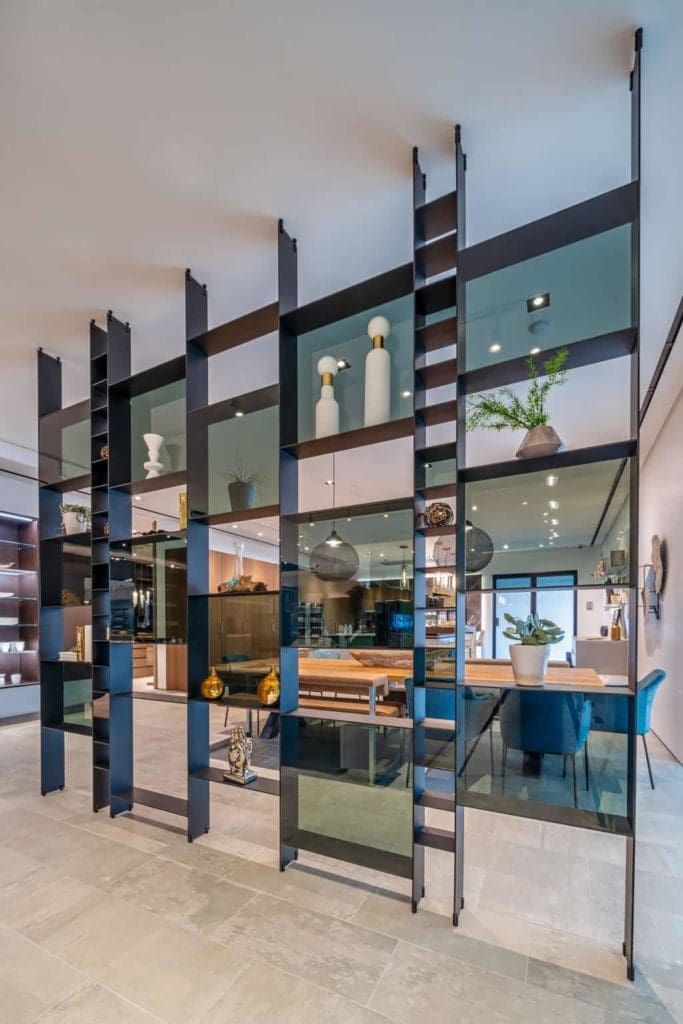 eggersmann’s 15 Square system is featured here as a room divider and display shelving.