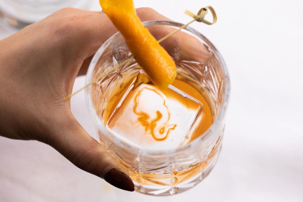 The Viejo Fashion at Âme is a twist on the classic Old Fashioned — made with tequila, grapefruit syrup, and orange bitters. (Photo by Kathy Tran)