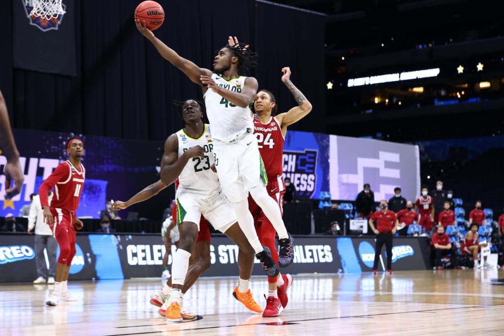 Davion Mitchell (No. 45) is part of a dynamic four guard Baylor attack. (Photo by Jamie Schwaberow/NCAA Photos via Getty Images)