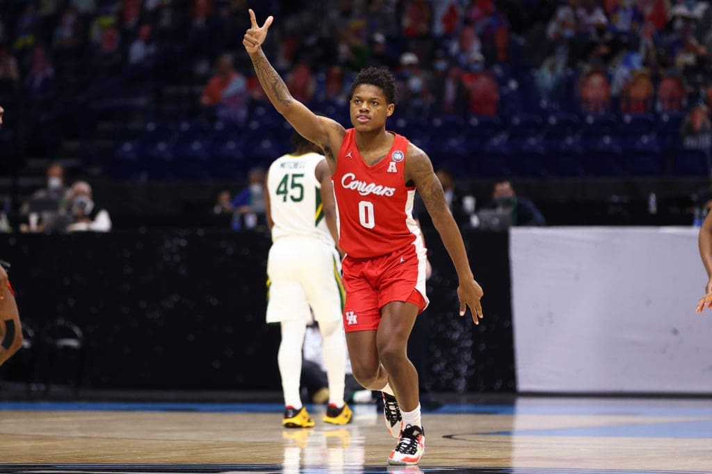 Marcus Sasser kept hitting threes early, desperately trying to keep Houston closer to Baylor. (Photo by Jamie Schwaberow/NCAA Photos via Getty Images)
