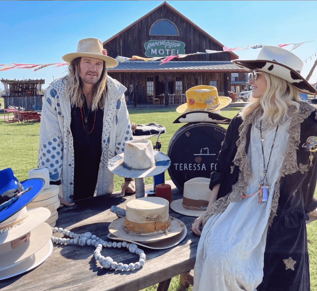 Tyler Hay Wild & Teressa Foglia of her namesake hat collection at the Round Top Antiques Show.