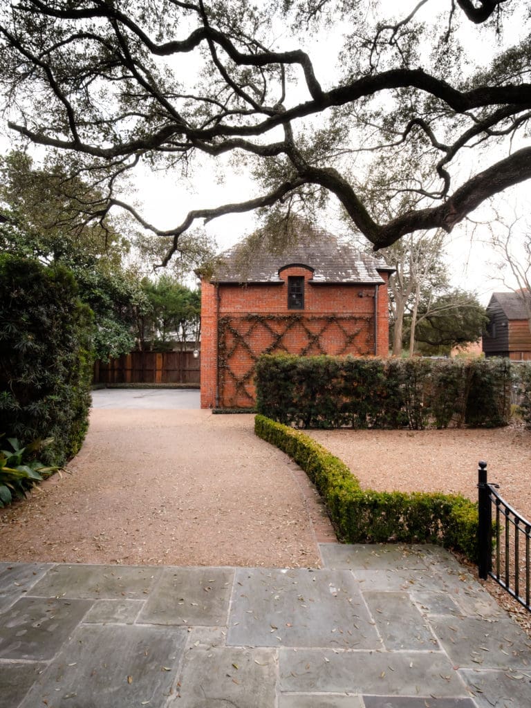 The three-car garage, which contains an elegant guesthouse (844 sq.ft.) above with full bath, kitchen, living and sleeping spaces at 1317 North Boulevard in Houston's Broadacres neighborhood.  (Photo by Jonathan Calvert)