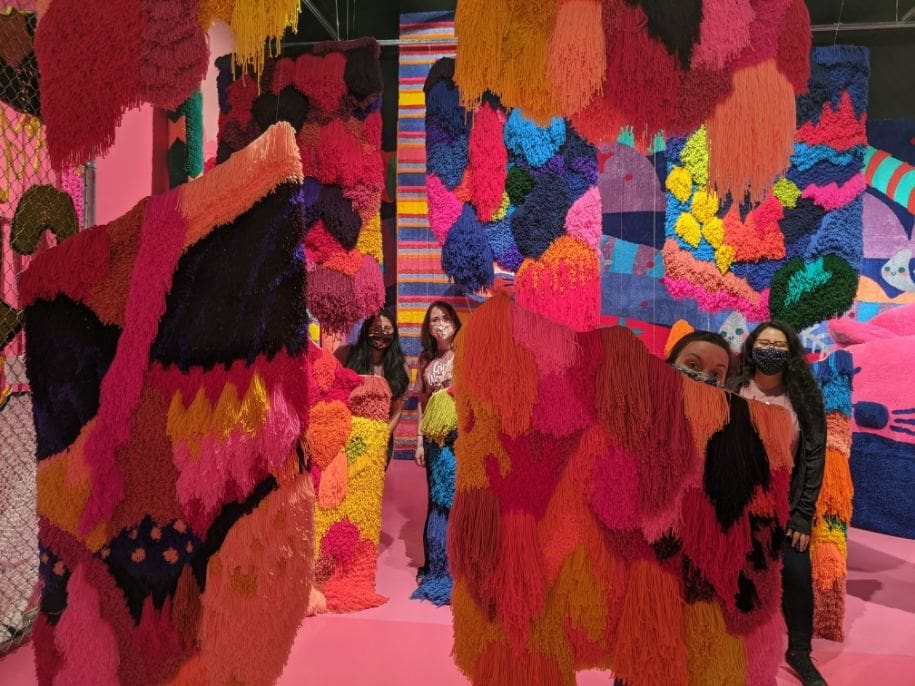 We highly recommend this unique exhibit that will make you feel like a kid again. Left to right: Estefany Sanchez, Elizabeth Moeller, Rachel Birdwell, Milca Sanchez. (Photo by Crystal Correa)