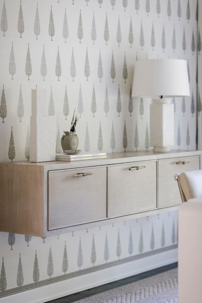 Muriel Brandolini fabric from Holland & Sherry cover the walls and windows of the wife's study. (Photo by Addison Jones)