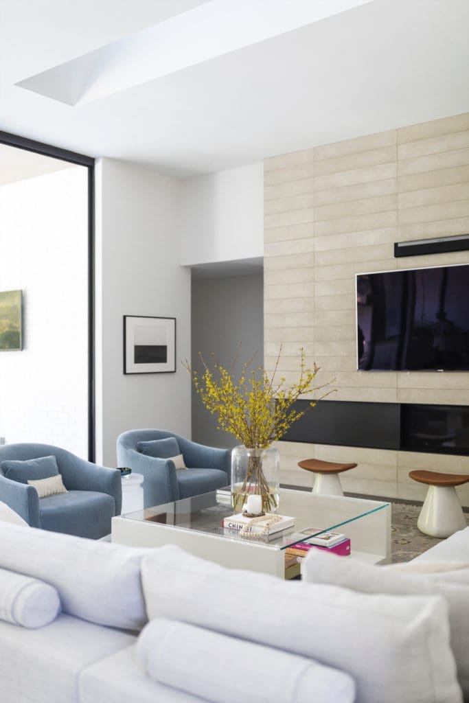 In the living area, leather-and-ceramic stools by Christophe Delcourt. Walter Knoll sofa. Hiroshi Sugimoto photograph, sourced by Anne Bruder from Marian Goodman Gallery, NY. (Photo by Addison Jones)
