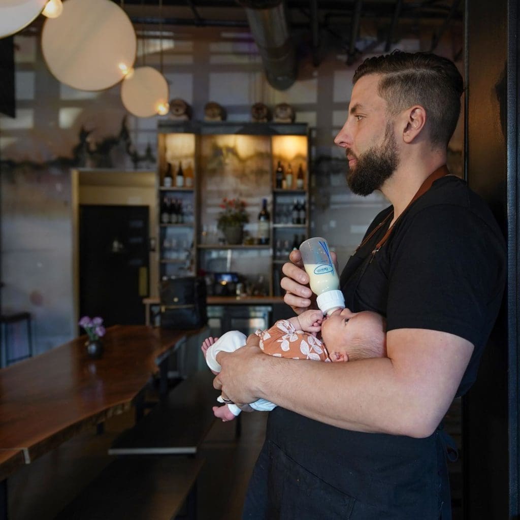 Daniel Cutler takes a family break at Ronan, the restaurant he owns with his wife, Caitlin Cutler. (Courtesy Ronan)