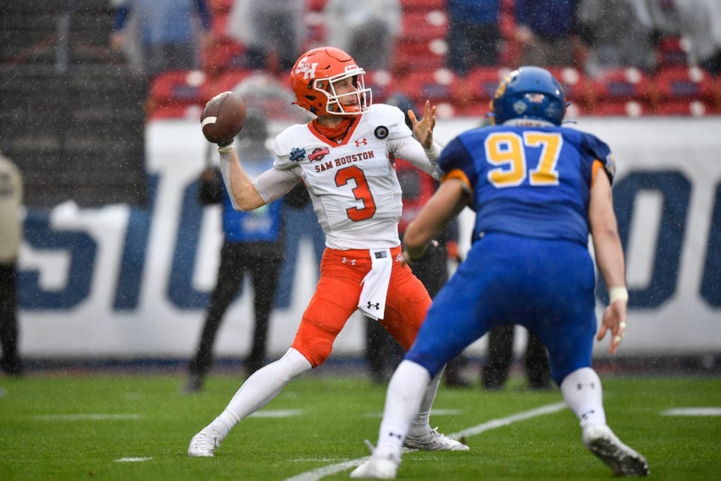  Eric Schmid threw in the rain, sacrificed his body on the ground and always stayed calm to drive Sam Houston State to its first national championship. (Photo by Andy Hancock/NCAA Photos via Getty Images)