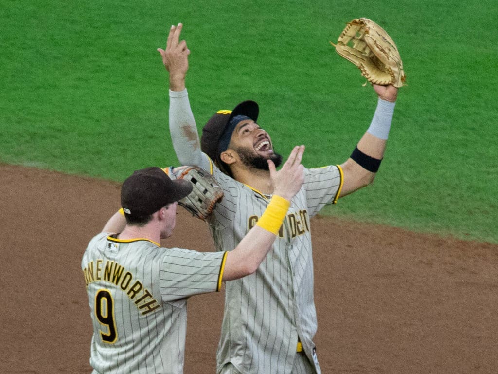 Fernando Tatis Jr. and the Padres know how to celebrate wins with style. (Photo by F. Carter Smith)