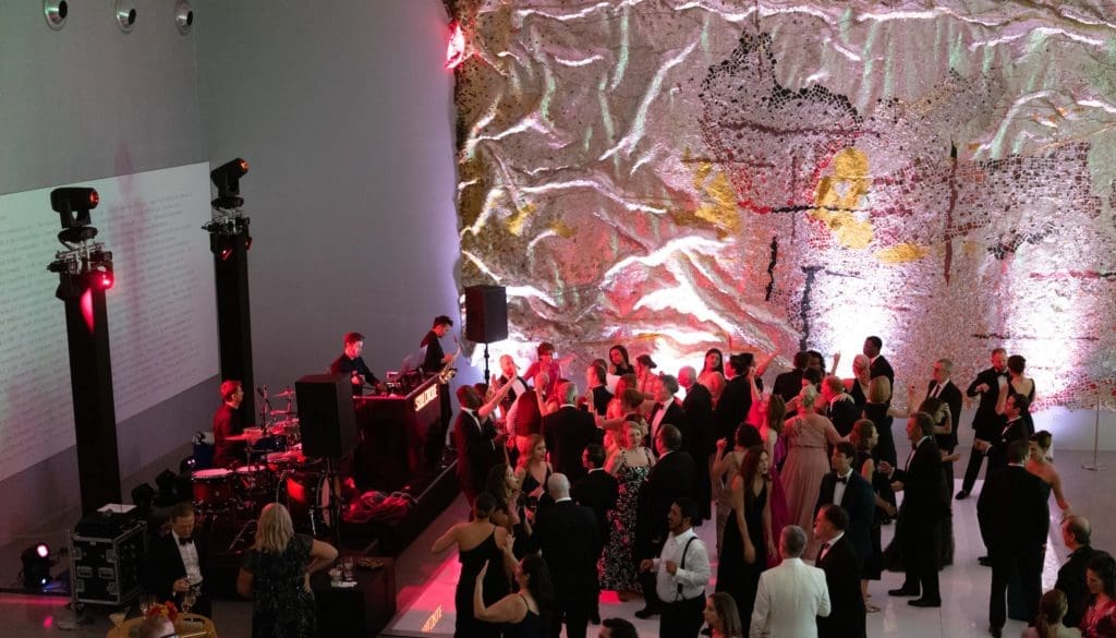 Dancing on the lower level of the Museum of Fine Arts, Houston's Nancy and Rich Kinder building closed out the May 2021 Grand Gala Ball. These balls are golden in their short programming. (Photo by Daniel Ortiz)