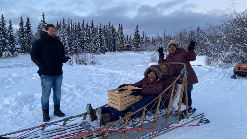 The Great Food Truck Race: Alaska Tasty Balls wining team loads up on the dog sled for grocery shopping in Fairbanks.