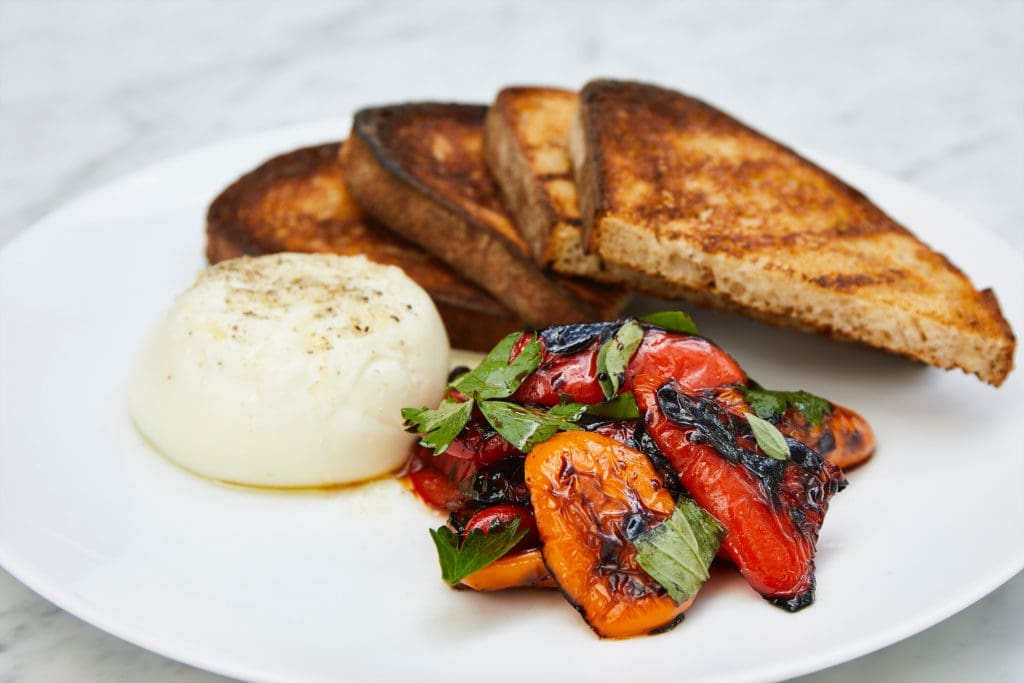 Burrata with roasted peppers at RH's Rooftop Restaurant and Park. (Photo by R2ro Photography)