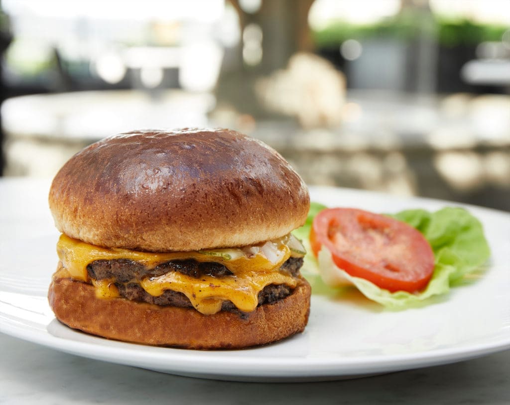 A must-try at RH Rooftop Restaurant is the popular RH Burger. (Photo by R2ro Photography)