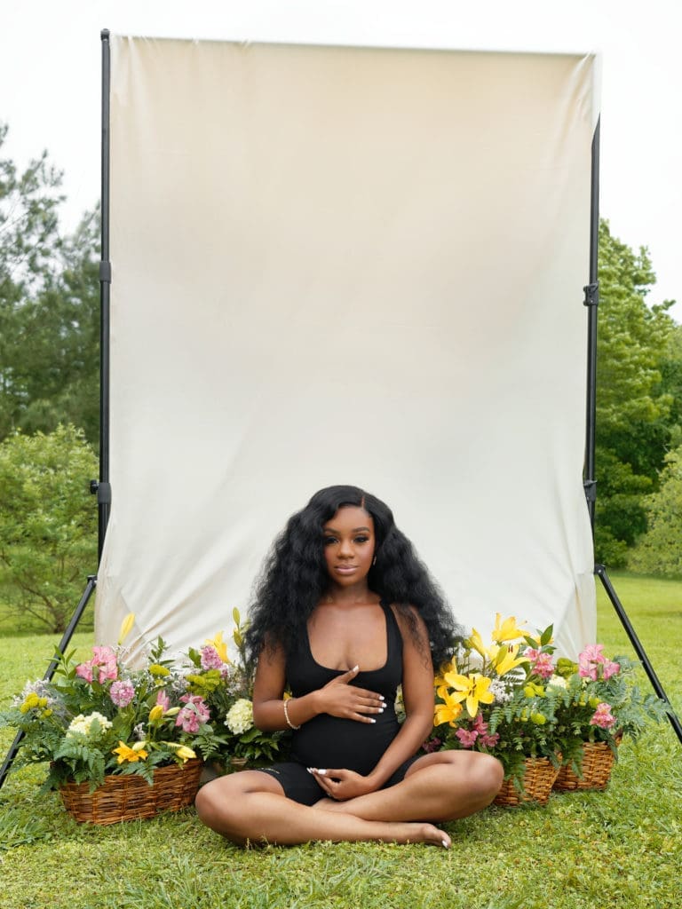 The black jumpsuit is Tai Bowen’s favorite piece from the collection because it has snap buttons that make it easy for mothers to breastfeed. (Photo by Mavricioh)