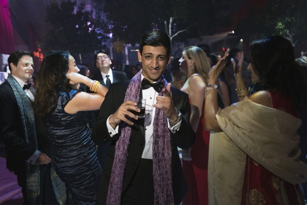 A Bollywood-handsome guest dancing at Asia Society Texas Center Tiger Ball (Photo by Daniel Ortiz)