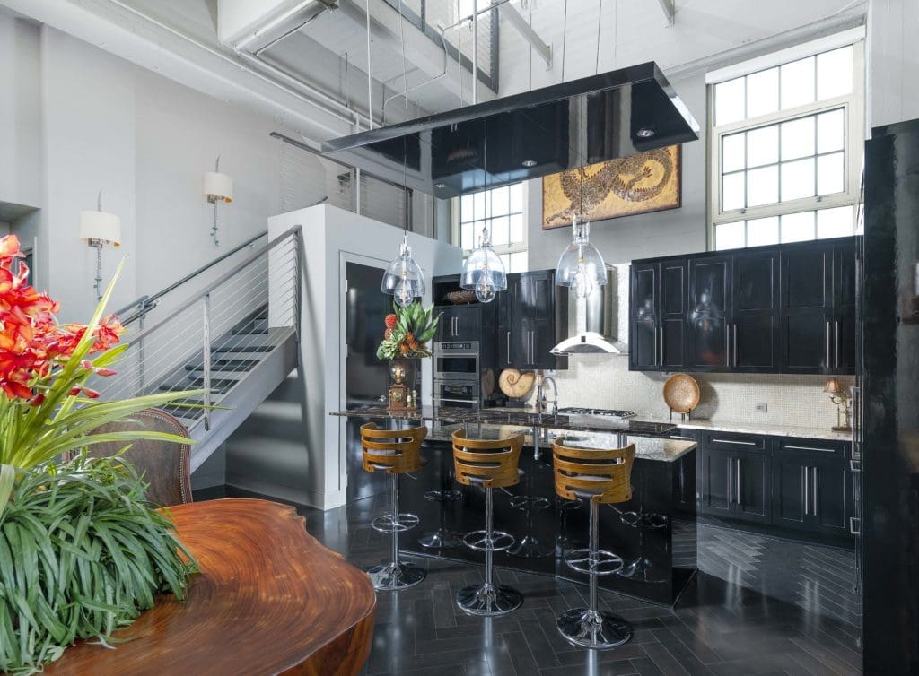 Modern and glamorous kitchen in Montgomery Plaza Penthouse. Courtesy of Piassick Photo.