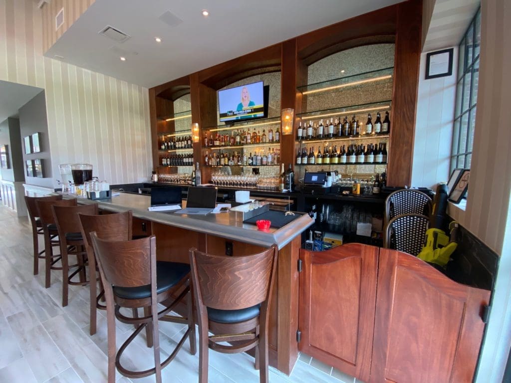 The cozy bar at NoPo Café, Market & Bar on North Post Oak is sure to be a popular watering hole for the neighborhood. (Photo by Shelby Hodge)