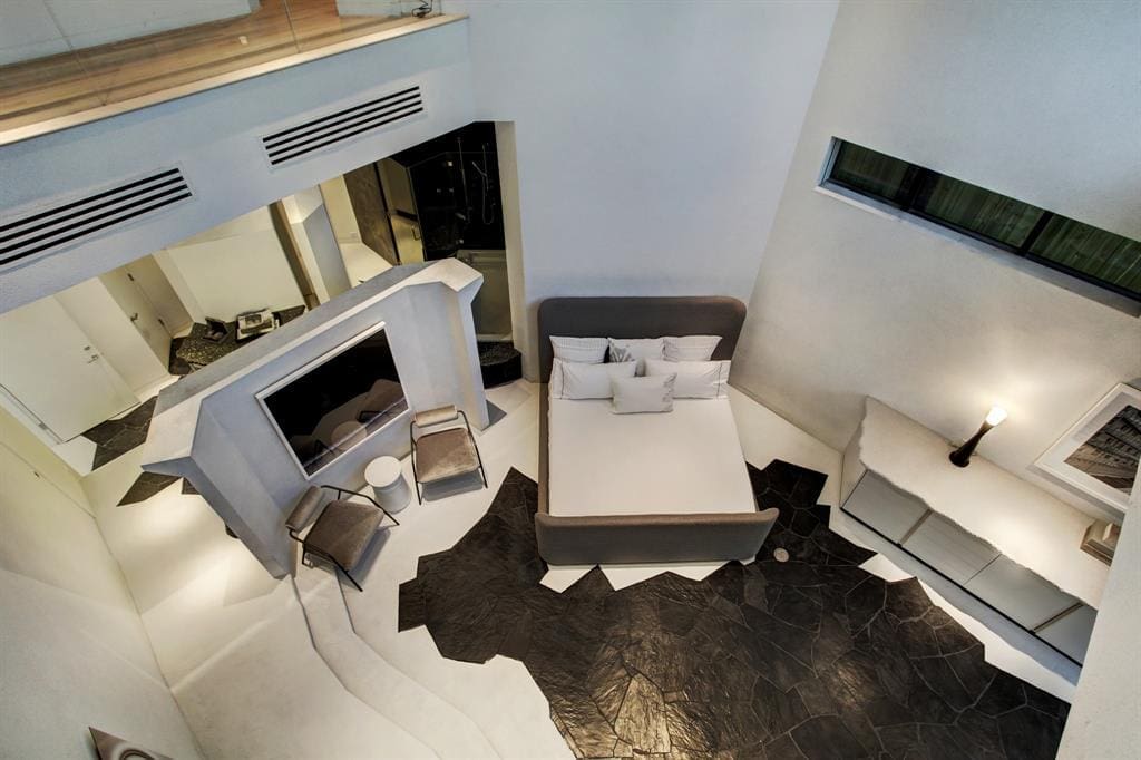 Second floor walkways look down in the primary bedroom in the Darth Vader house. (Photo courtesy of Martha Turner Sotheby’s International Realty) 