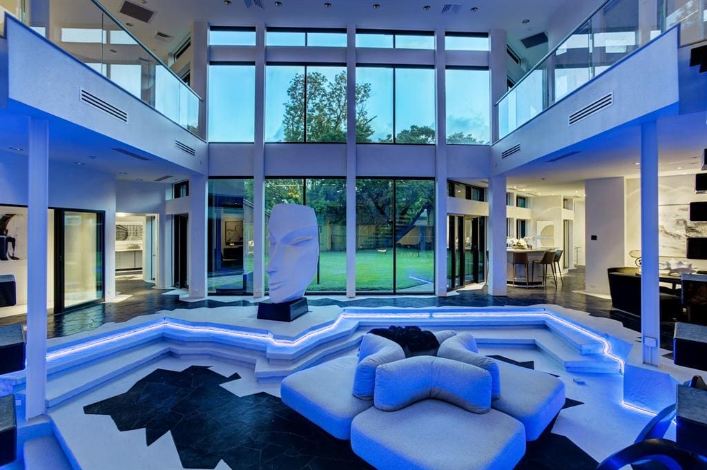3201 University Boulevard in Houston, aka the Darth Vader house, where neon lighting gives an eerie glow to the living room. (Photo courtesy of Martha Turner Sotheby's International Realty)