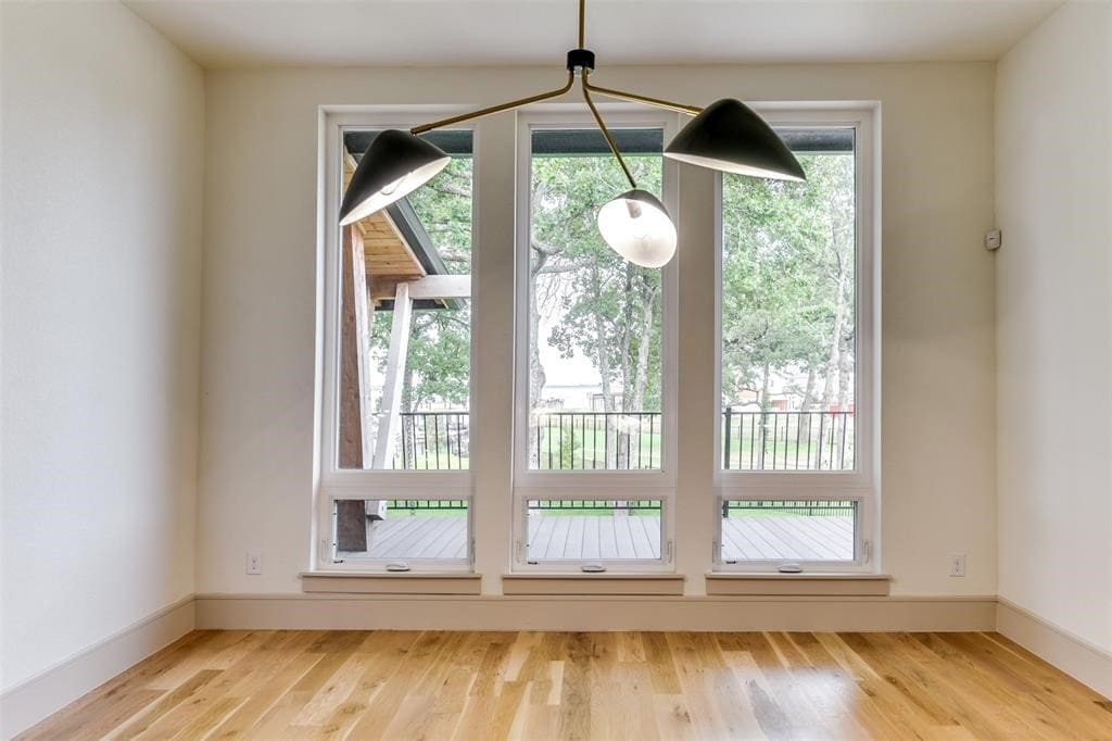 Modern light fixtures feature throughout the nearly 5,000-square-foot lake home. 