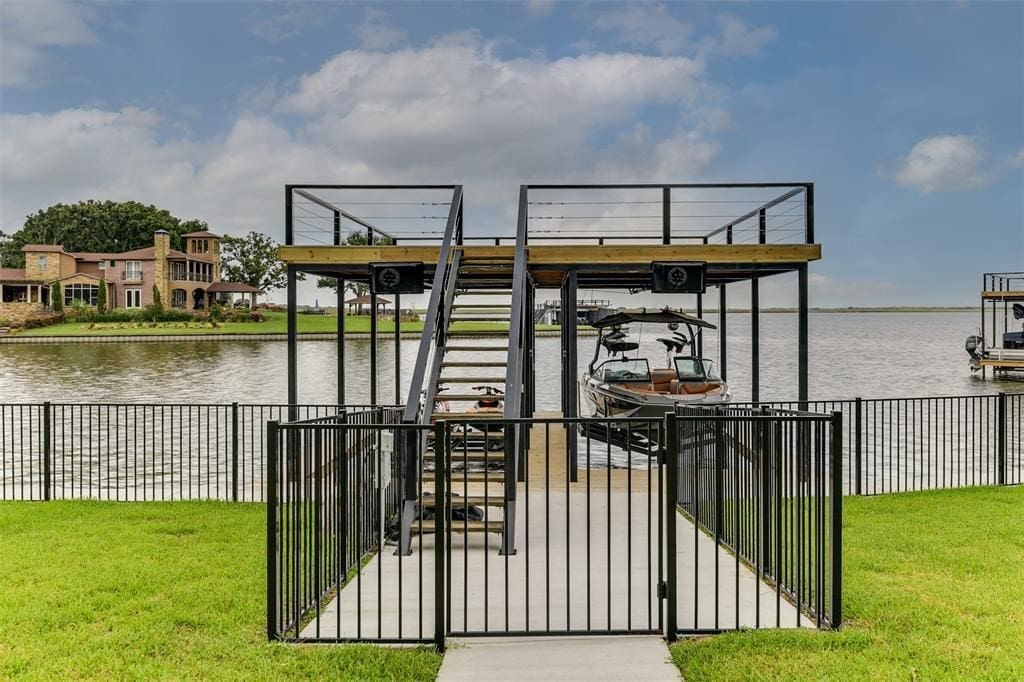 The home's boat dock is large enough to fit a ski boat and two jet skis. 