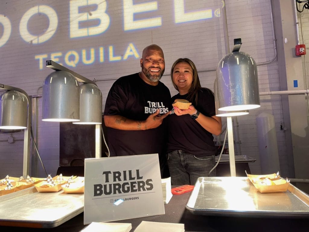 Bun B and Patsy Vivares team up to create delicious smashed burgers. (Photo by Julie Nong)