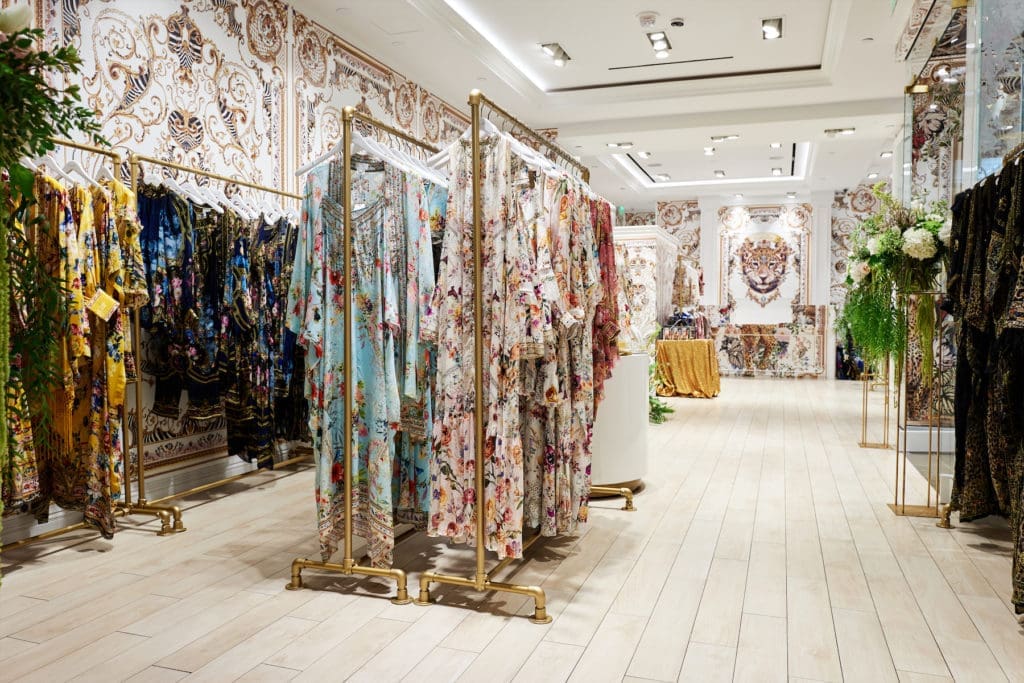 The Camilla store is lined with vibrant caftans, party dresses, and swimwear.