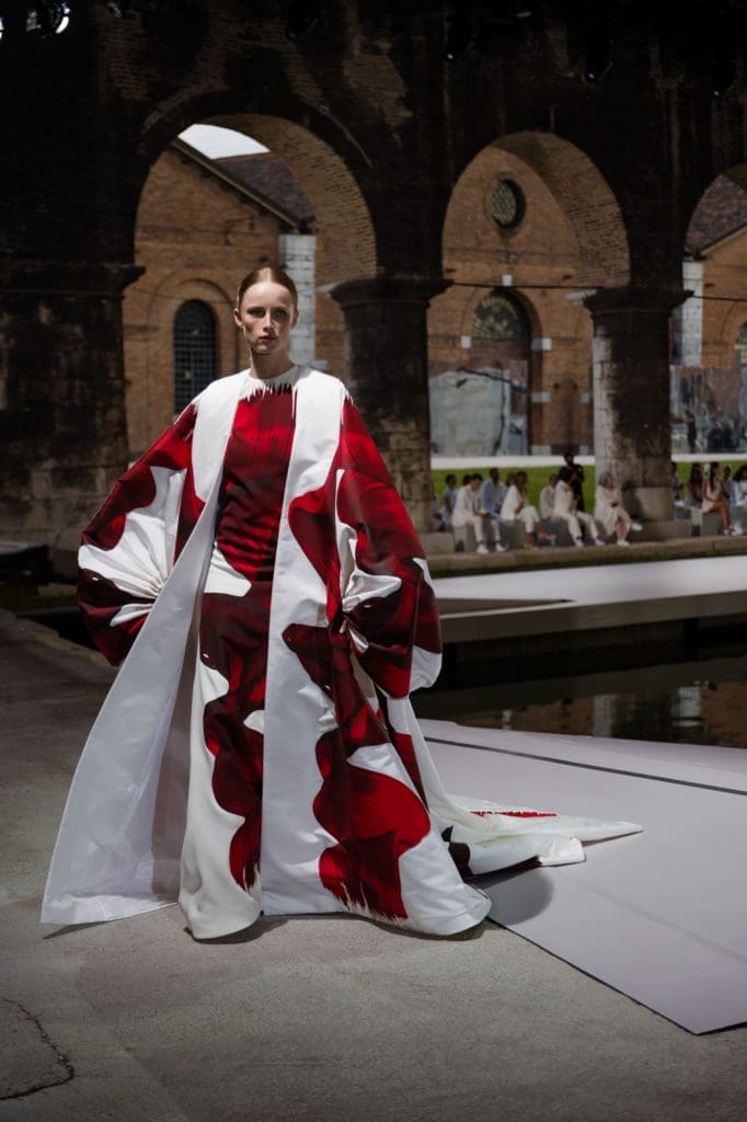 Two large-scale brushstroke paintings by British-born American artist Jamie Nares provided inspiration for this gown and cloak that closed the Valentino Haute Couture Fall 2021 presentation in Venice. (Photo courtesy of Valentino)
