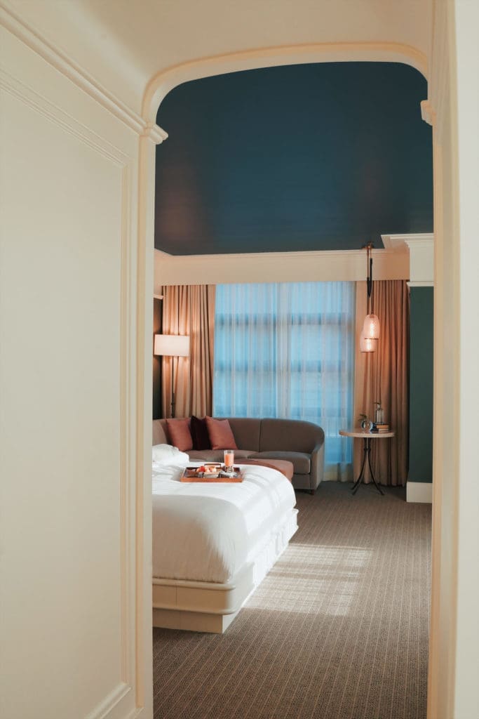Rooms at Perry Lane Hotel vary from guest rooms to suites and provide luxe bath products.