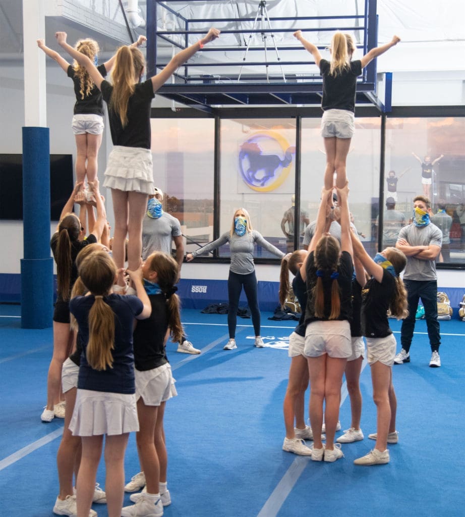 Mustang Cheer is a Dallas cheerleading gym that fosters young athletes and builds self-confidence.