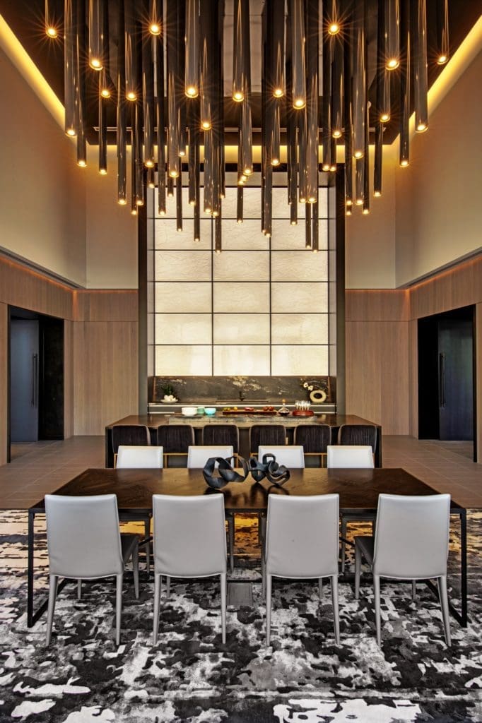 All the private rooms in The Victor high-rise — including this lavish dining room on the ninth floor — can be reserved by residents for free. (Photo by  Eric Laigne)