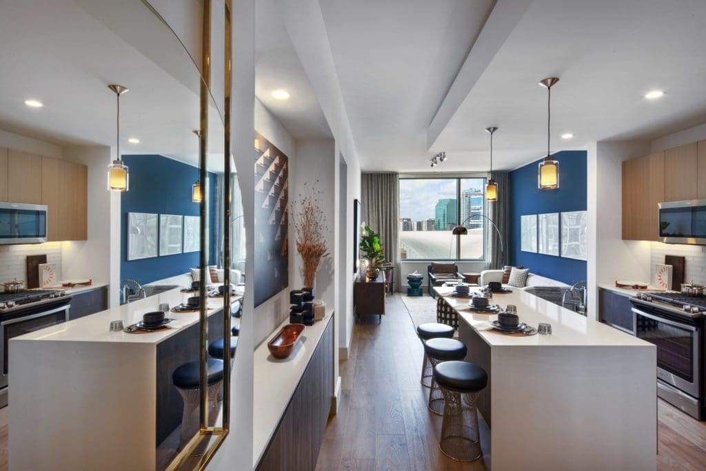 The Victor boasts kitchens with high-end cabinetry and all kinds of extras. (Photo by  Eric Laigne)