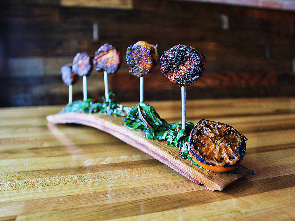 The Duroc Pork Belly Lollipops are a favorite at Rye.